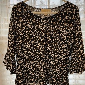 Michael Kors top with flutter sleeves. Black with white hearts. Size Large